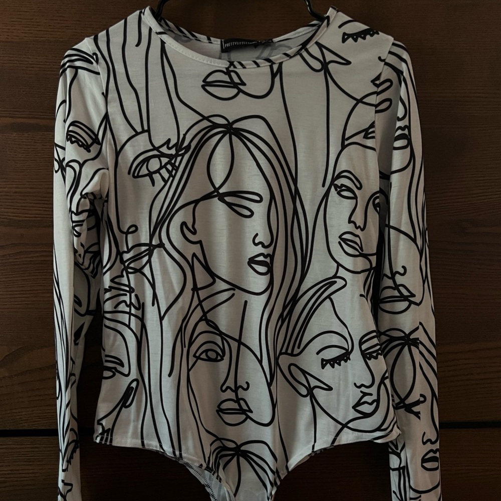 PrettyLittleThing Black and White Asymmetrical Long Sleeve Bodysuit